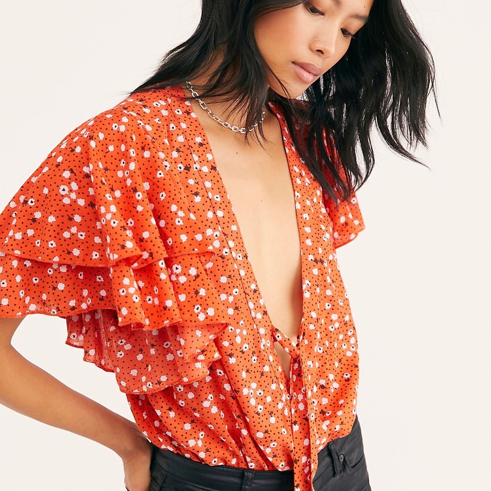 Free People bodysuit call me later orange comb NWT
